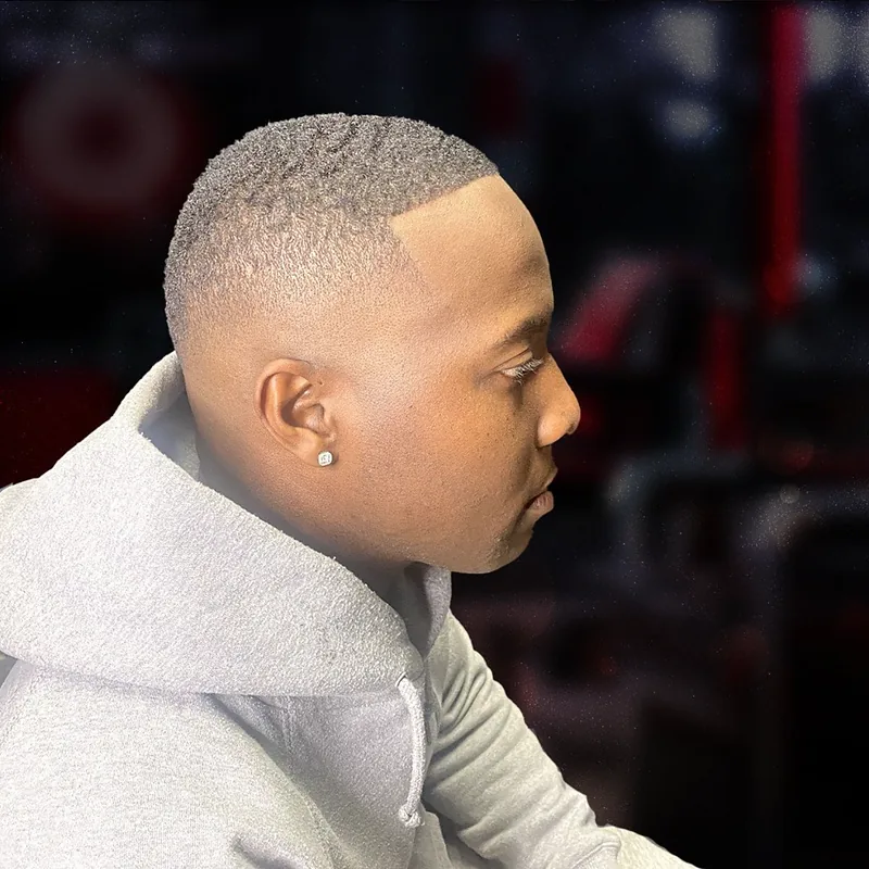 Blonde buzz cut with a skin fade